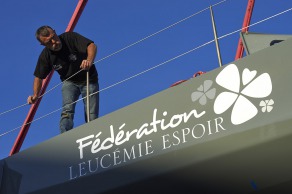 23 juin 2015, Lorient, mise à l'eau du monocoque 60 pieds IMOCA Queguiner, skipper, Yann Elies.